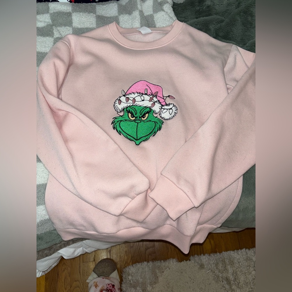 Playful Pink Grinch Sweatshirt